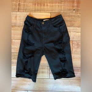 Black Capri cut out ripped shorts